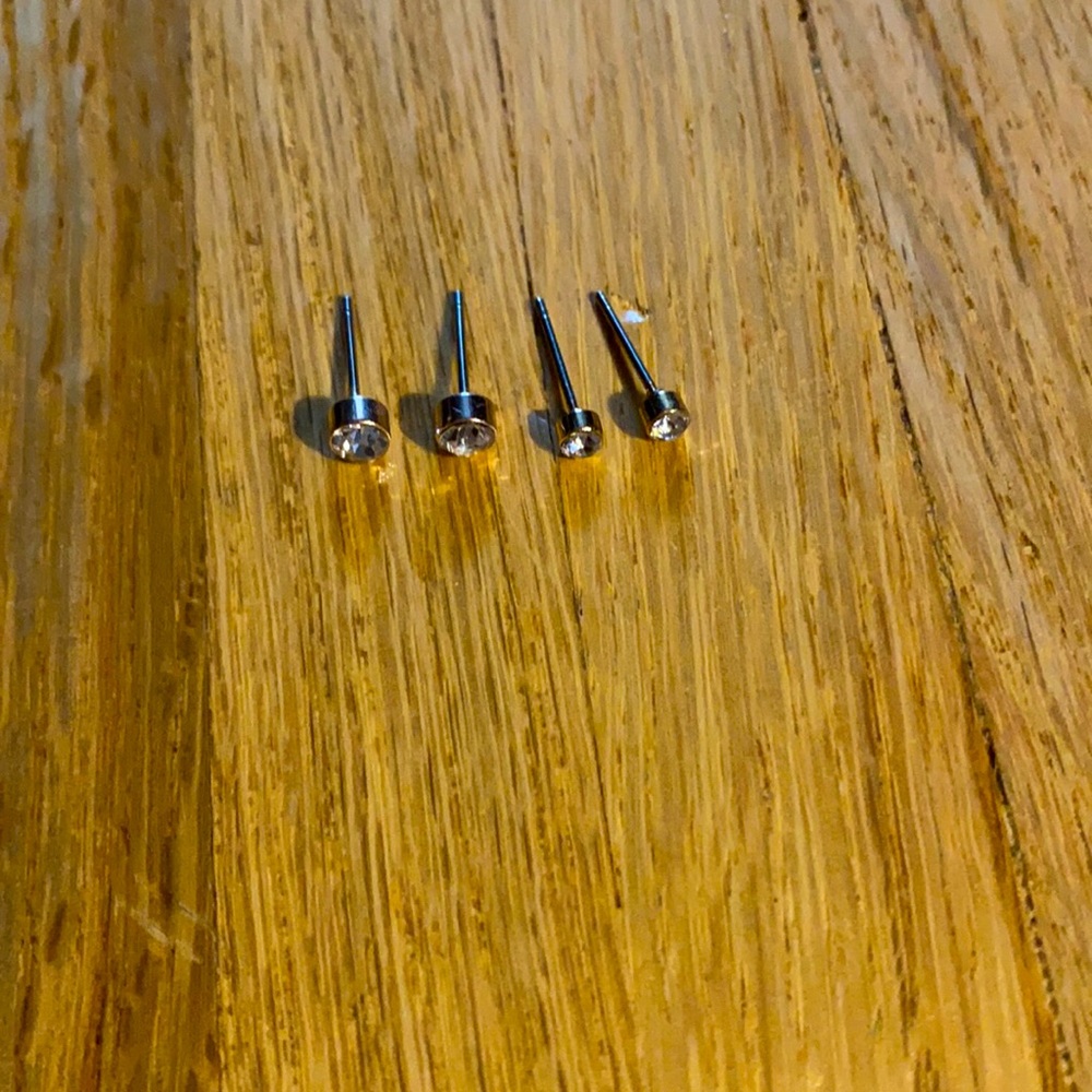 Silver earrings.
